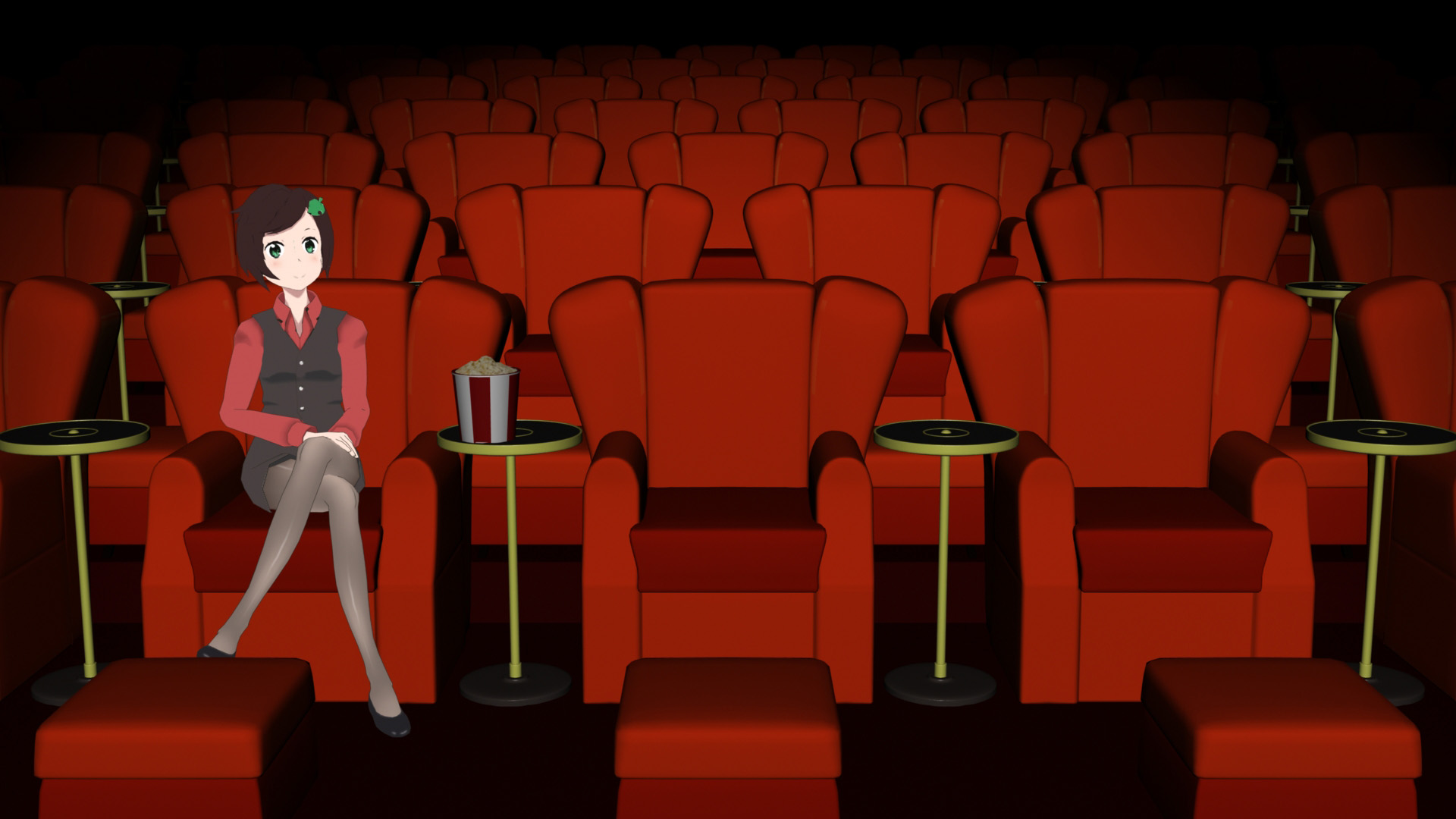Comfy-tan sitting in a theatre on comfy seats